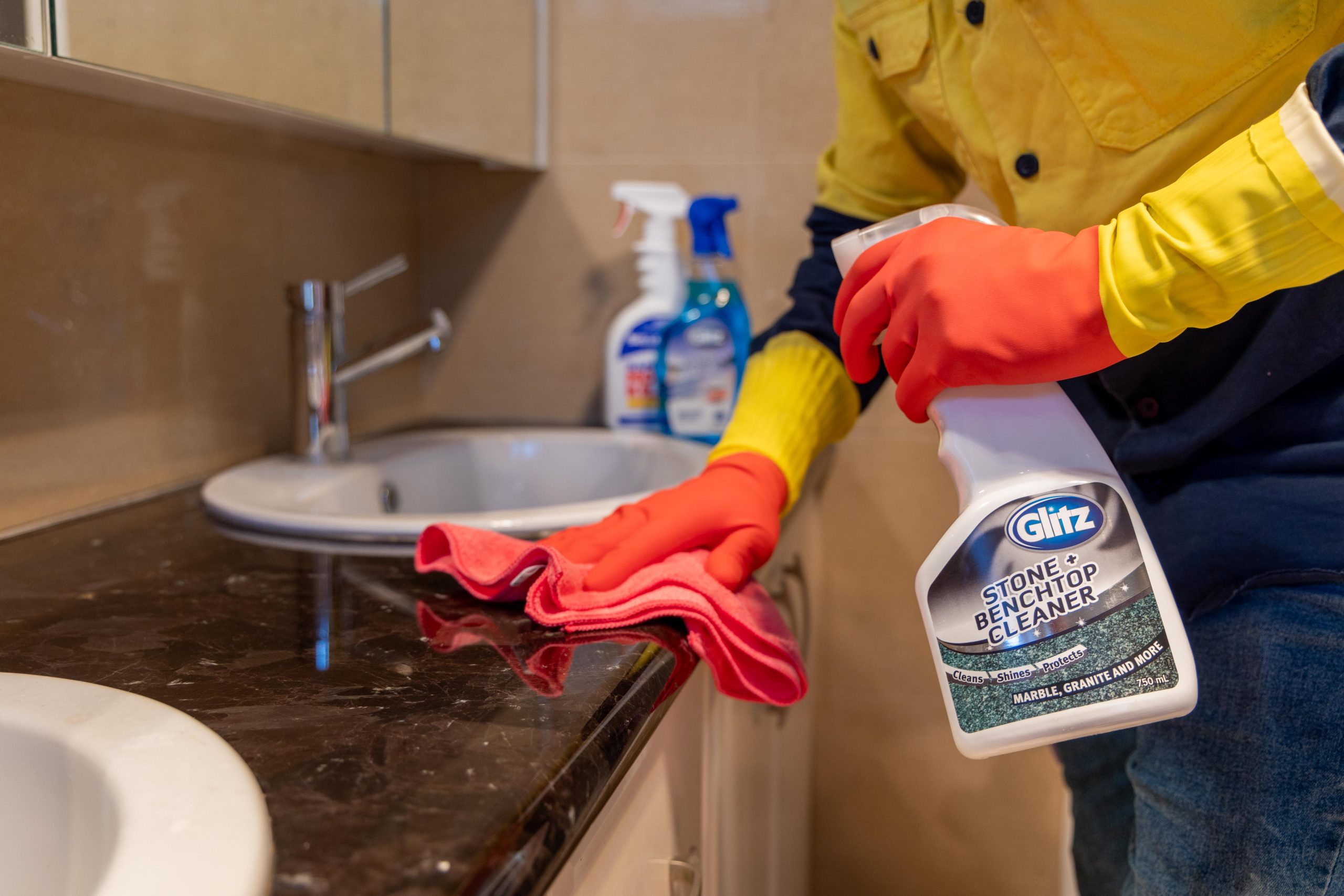 R6 3948 scaled Hiring Vacate Cleaners to Ensure Your Get Your Bond Back 1 Perth cleaner scrubbing a laundry benchtop